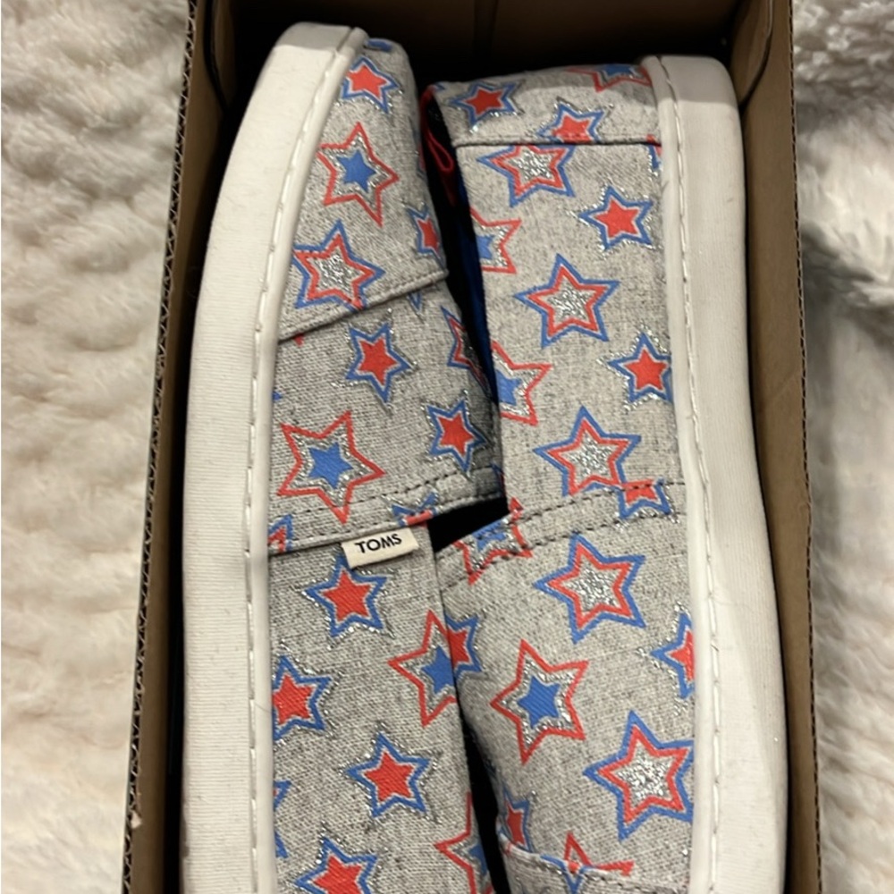 TOMS Gray Slip-Ons with Red and Blue Star Design